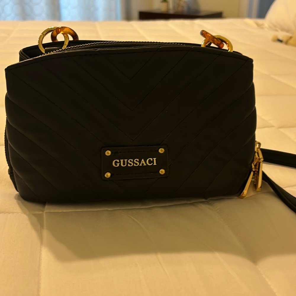 Black Gussaci crossbody handbag purse.